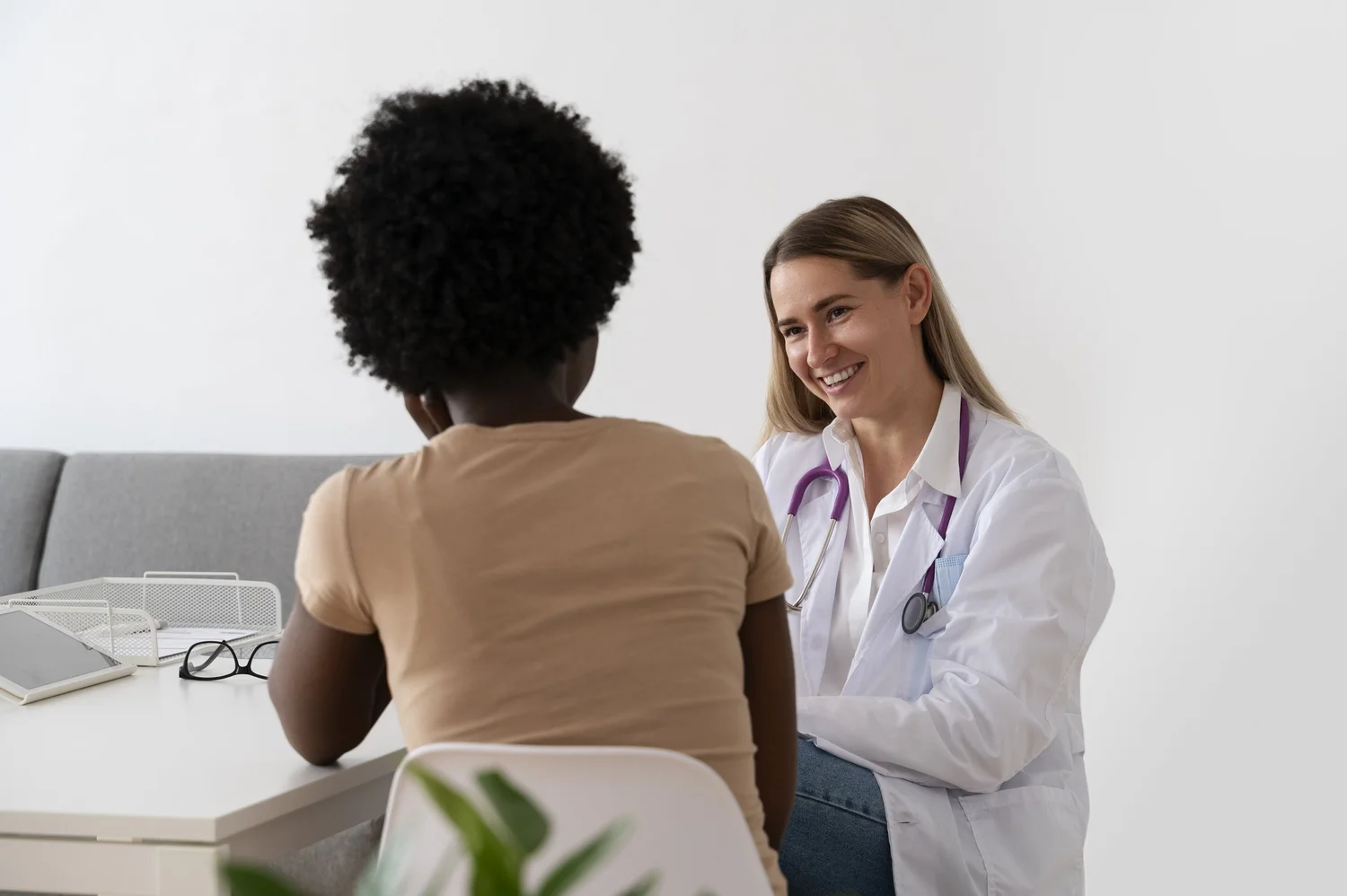 Doctor consulting with patient